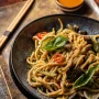 NOODLES WITH BEEF IN GREEN CURRY (Spicy) .